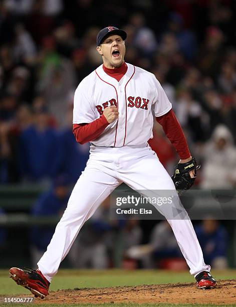 Jonathan Papelbon of the Boston Red Sox celebrates the win over the Chicago Cubs on May 22, 2011 at Fenway Park in Boston, Massachusetts. Before this...