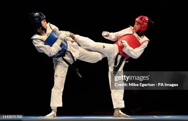 Turkey's Irem Yaman competes against Brazil's Caroline Santos in the Final of the Womens -62kg during Day 5 of the World Taekwondo Championships at...