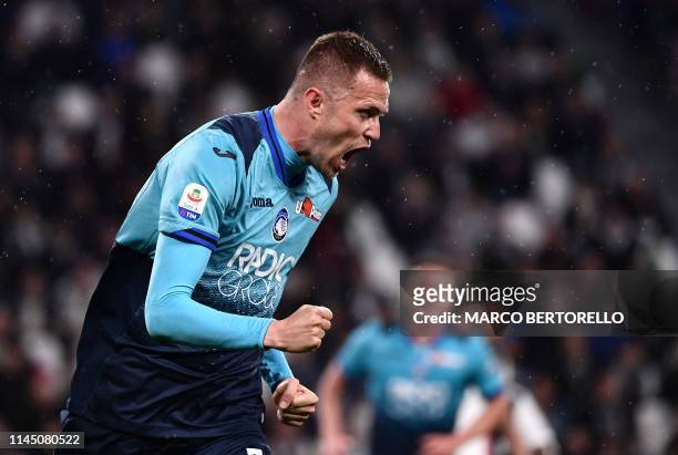 Atalanta's Slovenian midfielder Josip Ilicic celebrates after scoring during the Italian Serie A football match Juventus vs Atalanta on May 19, 2019...
