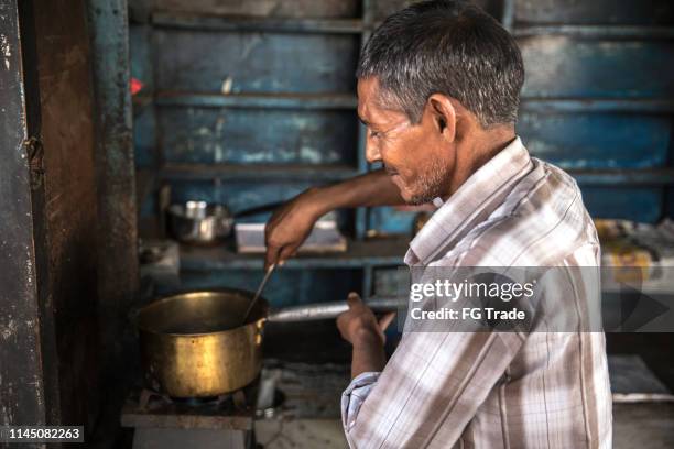 small business street vendor indian owner - indian slums stock pictures, royalty-free photos & images