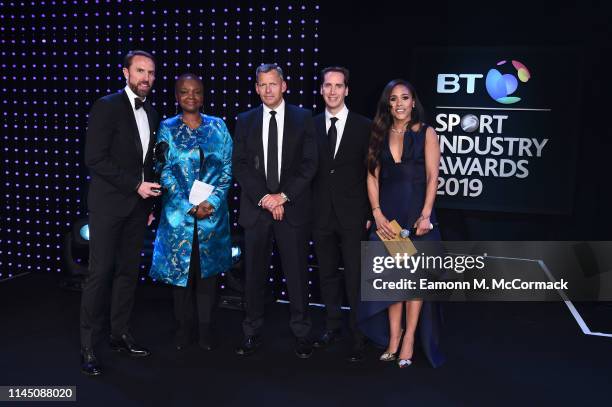 Alex Scott and Baroness Amos present the Leadership in Sport Award to The FA & England World Cup Squad, accepted by Gareth Southgate, Manager of...