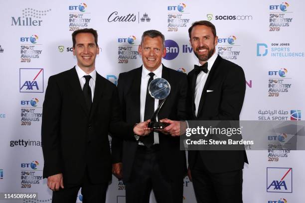 Mark Bullingham, CEO of The FA, Martin Glenn, former CEO of The FA and Gareth Southgate, Manager of England pose with the Leadership in Sport Award,...