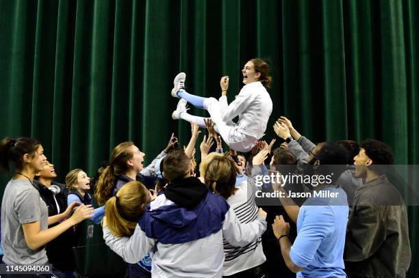 Anne Cebula of the Columbia Lions celebrates her victory in the epee during the Division I Women's Fencing Championship held at The Wolstein Center...