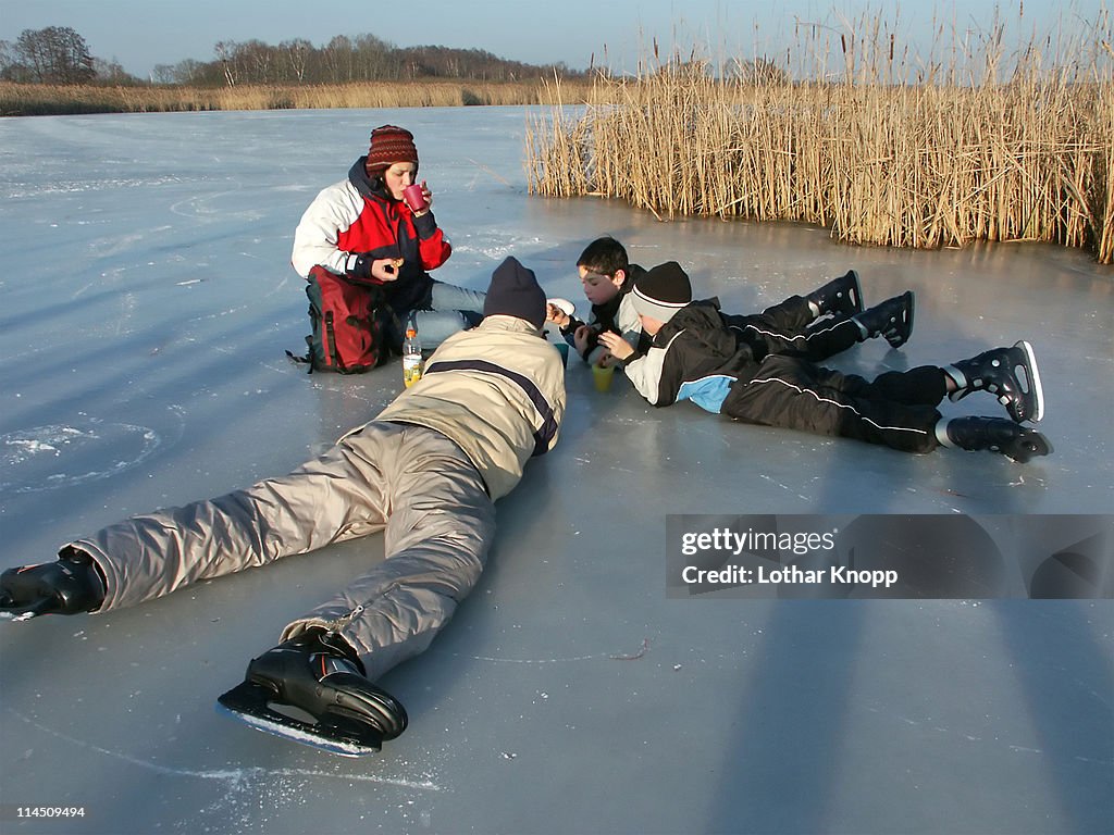 Ice skating on frozen lake rangs dorf near berlin