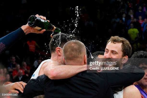 Moscow's Spanish guard Sergio Rodriguez celebrates with teammates after winning the EuroLeague final basketball against Anadolu Efes at the Fernando...