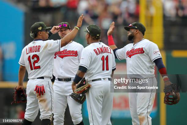 Cleveland Indians shortstop Francisco Lindor , Cleveland Indians infielder Mike Freeman , Cleveland Indians third baseman Jose Ramirez , and...