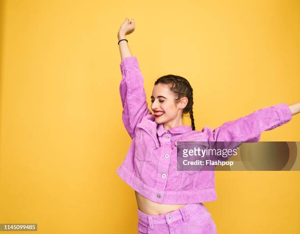 colourful studio portrait of a young woman - women happy bildbanksfoton och bilder