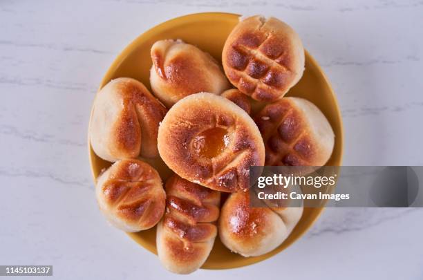 marzipan in yellow bowl for christmas - marzipan stock pictures, royalty-free photos & images