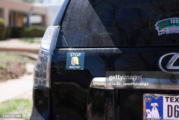 santa fe, nm: "stop bigotry" bumper sticker on car - bumper sticker stock pictures, royalty-free photos & images