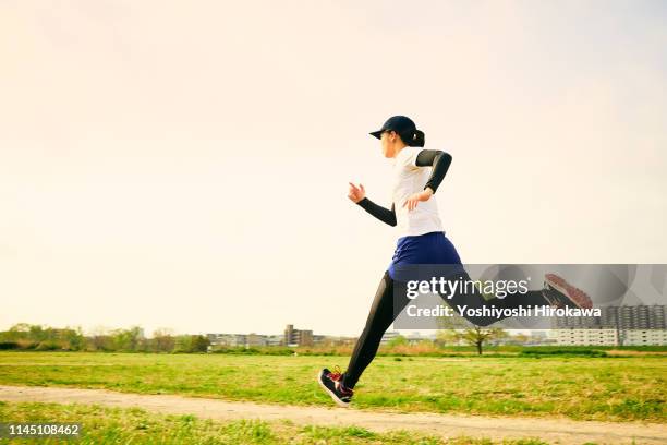 japanese teen women are running in preparation for exercise - circuit training stock pictures, royalty-free photos & images