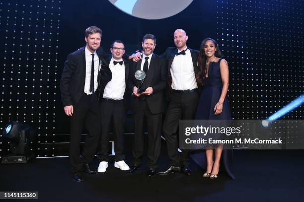 Alex Scott and Mark Durden-Smith present the Agency of the Year to Octagon during the BT Sport Industry Awards 2019 at Battersea Evolution on April...