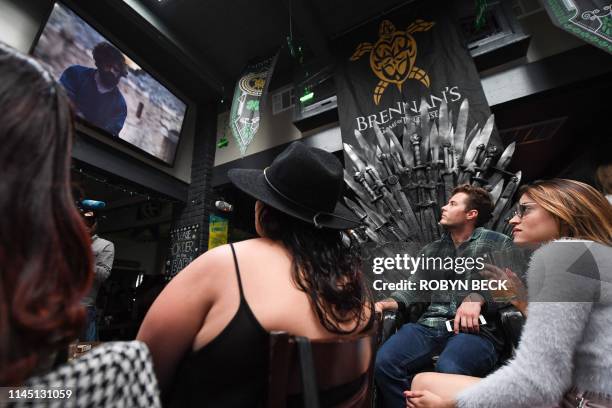 Fans watch HBO's "Game of Thrones" series finale at a viewing party at Brennan's bar in Marina del Rey, California, May 19, 2019.