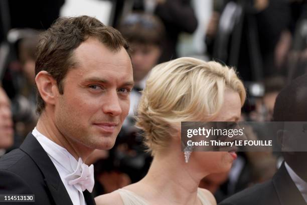 Jury Members Jude Law and Linn Ullmann attend the 'Les Bien-Aimes' premiere at the Palais des Festivals during the 64th Cannes Film Festival at...