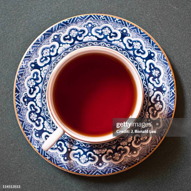 tea for one - tea cup overhead view photos et images de collection