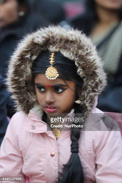 Tamil girl listens to a somber song during Tamil Genocide Remembrance Day on May 18, 2019 in Scarborough, Ontario, Canada. This year marks the 10th...
