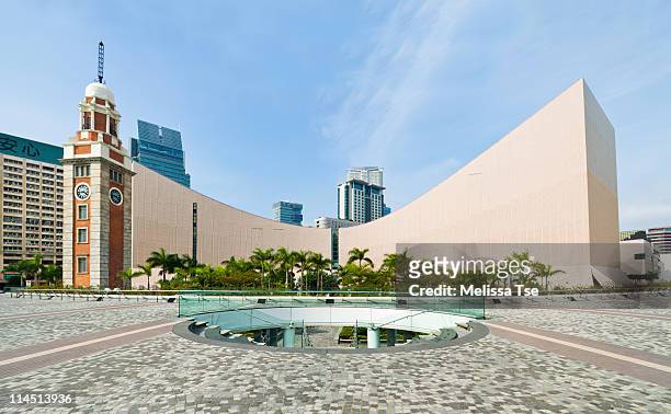 clock tower & hong kong cultural center - tsim sha tsui stock-fotos und bilder