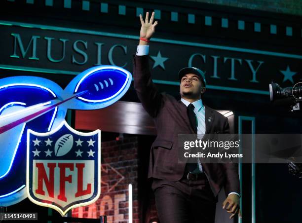 Andre Dillard of Washington State reacts after being chosen overall by the Philadelphia Eagles during the first round of the 2019 NFL Draft on April...