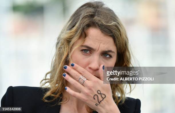 French actress Adele Haenel poses during a photocall for the film "Portrait Of A Lady On Fire " at the 72nd edition of the Cannes Film Festival in...