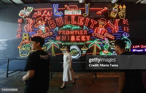 People gather at Grand Central Market on April 25, 2019 in Los Angeles, California, According to a Bloomberg study of the most recent Bureau of...