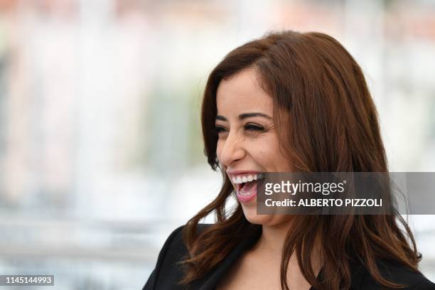 Moroccan actress Nisrin Erradi smiles during a photocall for the film "Adam" at the 72nd edition of the Cannes Film Festival in Cannes, southern...