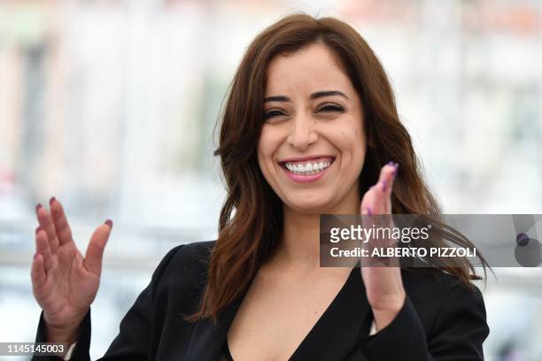 Moroccan actress Nisrin Erradi smiles during a photocall for the film "Adam" at the 72nd edition of the Cannes Film Festival in Cannes, southern...