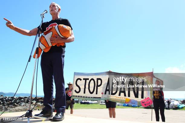 Bob Brown holds a toy Nemo doll given to him by an audience member as he speaks during a anti Adani Carmichael Coal Mine rally on April 26, 2019 in...