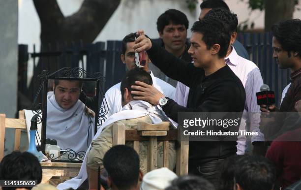 Bollywood actor Aamir Khan during the promotion of his forthcoming film 'Ghajini', on December 21, 2008 in New Delhi, India. The actor turned barber...