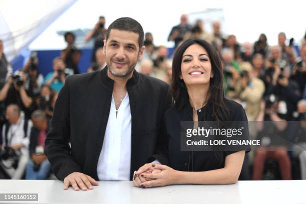 Moroccan producer Nabil Ayouch and Moroccan film director Maryam Touzani pose during a photocall for the film "Adam" at the 72nd edition of the...