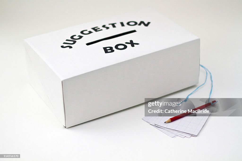 A Suggestion Box with paper and pencil