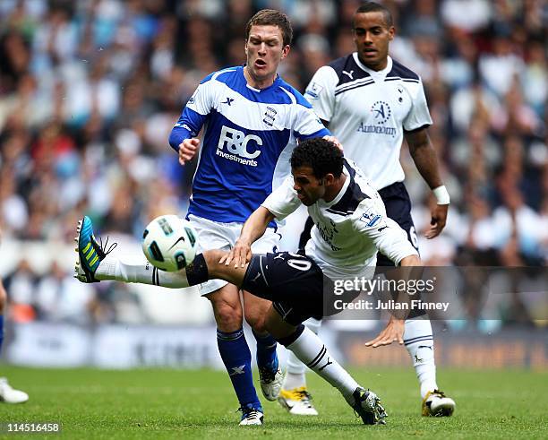 Craig Gardner of Birmingham City is challenged by Sandro of Tottenham Hotspur during the Barclays Premier League match between Tottenham Hotspur and...