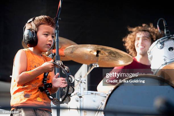 Young fan joins Joey Peebles of Troy Andrews & Orleans Avenue onstage during the 2011 Hangout Music Festival on May 22, 2011 in Gulf Shores, Alabama.
