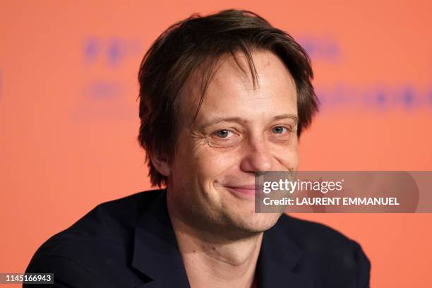 German actor August Diehl attends a press conference for the film "A Hidden Life" at the 72nd edition of the Cannes Film Festival in Cannes, southern...