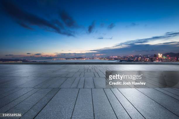 city rooftop and parking lot - focus on foreground stock pictures, royalty-free photos & images
