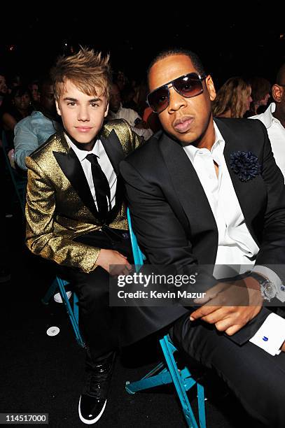 Singer Justin Bieber and rapper Jay-Z pose in the audience during the 2011 Billboard Music Awards at the MGM Grand Garden Arena May 22, 2011 in Las...