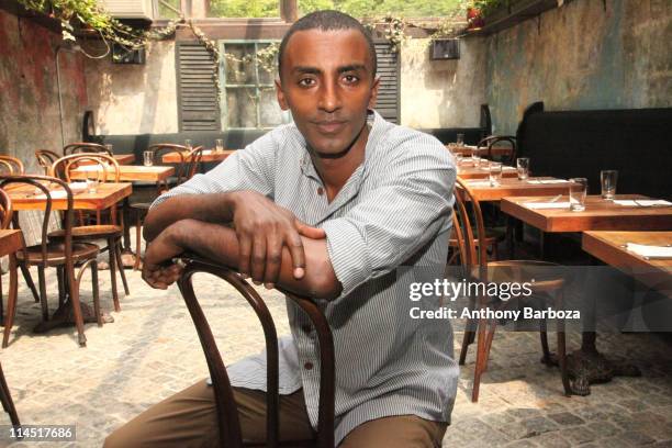 Portrait of Ethiopian-born Swedish chef Marcus Samuelsson in the atrium dining room of his Harlem restaurant, Red Rooster, New York, New York, 2010.