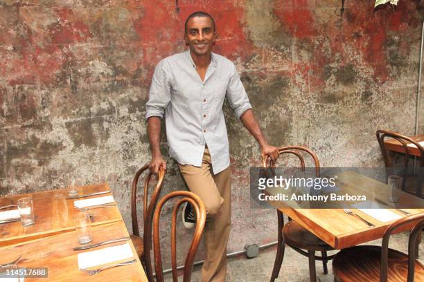 Portrait of Ethiopian-born Swedish chef Marcus Samuelsson in the atrium dining room of his Harlem restaurant, Red Rooster, New York, New York, 2010.