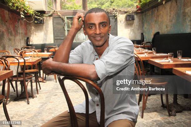 Portrait of Ethiopian-born Swedish chef Marcus Samuelsson in the atrium dining room of his Harlem restaurant, Red Rooster, New York, New York, 2010.