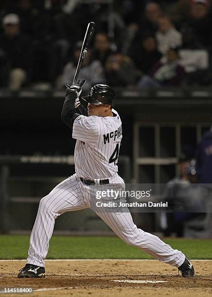 Dallas McPherson of the Chicago White Sox hits a pich-hit single in the 8th inning against the Texas Rangers at U.S. Cellular Field on May 17, 2011...