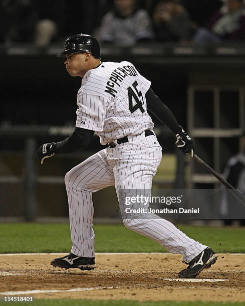 Dallas McPherson of the Chicago White Sox hits a pich-hit single in the 8th inning against the Texas Rangers at U.S. Cellular Field on May 17, 2011...