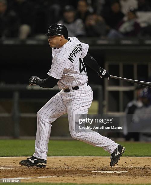 Dallas McPherson of the Chicago White Sox hits a pich-hit single in the 8th inning against the Texas Rangers at U.S. Cellular Field on May 17, 2011...