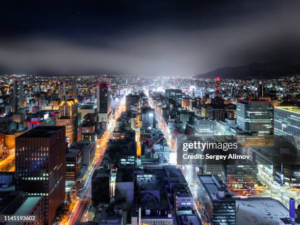 night view of sapporo in winter - hokkaido city stock pictures, royalty-free photos & images