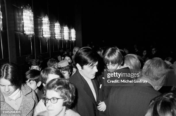 French actor Alain Delon with his son Anthony at the premiere of the film Tintin, in Paris.