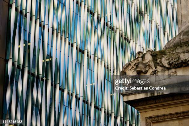 two contrast steel architecture adjacent building, london, uk - two international finance center stock pictures, royalty-free photos & images