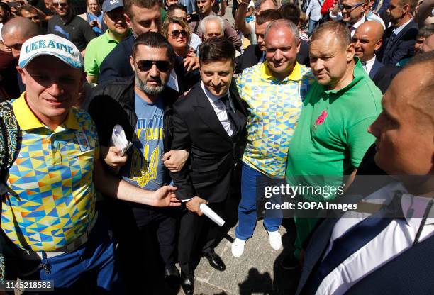 Ukrainian President Volodymyr Zelenskiy seen gathered with his supporters after his inauguration ceremony at the Ukrainian Parliament building in...