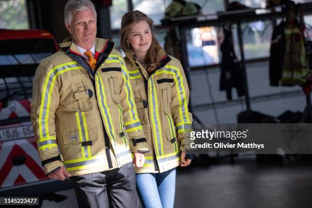 King Philippe of Belgium and Princess Elisabeth, Duchess of Brabant attend a firefighter's training session on April 26, 2019 in Brussels, Belgium....