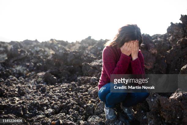 woman with broken heart missing her family - mount disappointment stock pictures, royalty-free photos & images
