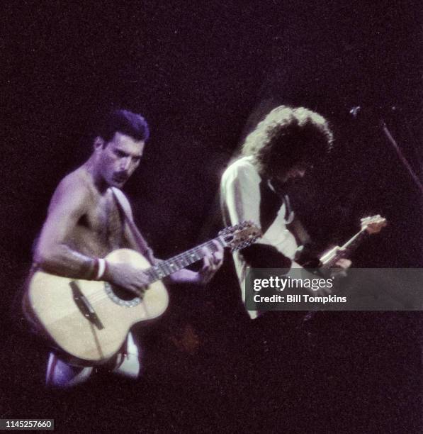 July 1982]: Freddy Mercury and Brian May of Queen perform at Madison Square Garden July 1982 in New York City.