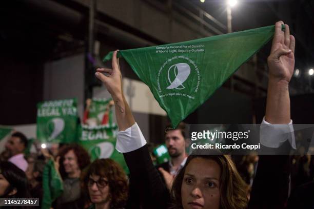 Girl holds a sing in favor of legal abortion during the 45th Buenos Aires Book Fair at La Rural Exhibition and Conference Centre on April 25, 2019 in...