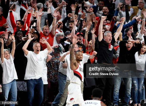 Damian Lillard of the Portland Trail Blazers waves goodbye to the Oklahoma City Thunder after hitting a last second 37 foot game winner to end Game...
