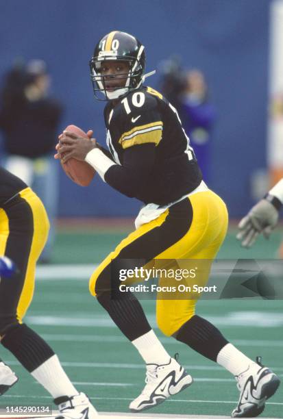 Kordell Stewart of the Pittsburgh Steelers drops back to pass against the New England Patriots during the AFC Divisional Playoffs on January 3, 1998...